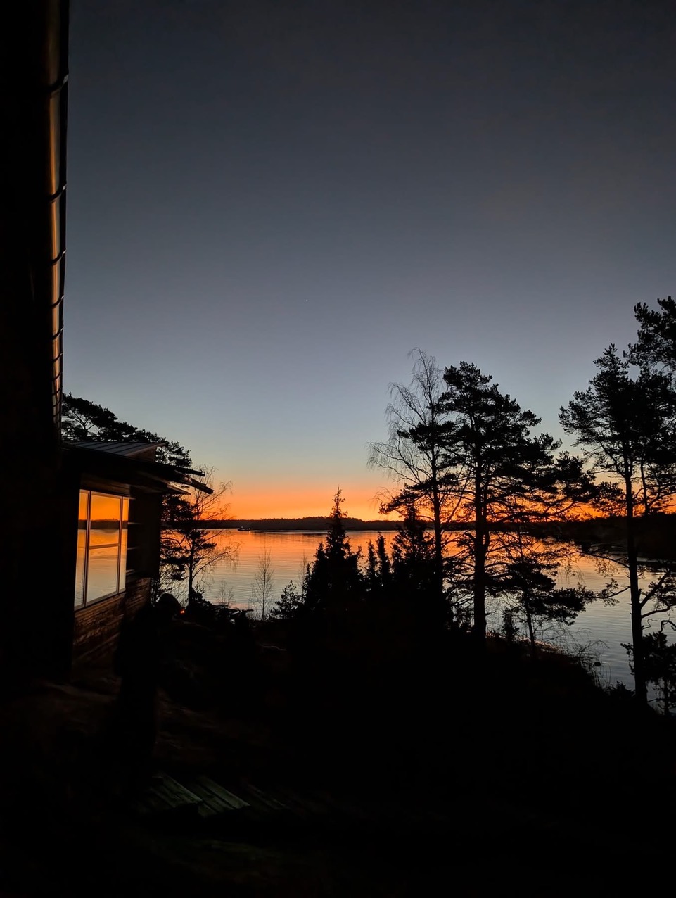 Dusk over the water at Ekskäret, seen from one of the island's lodges