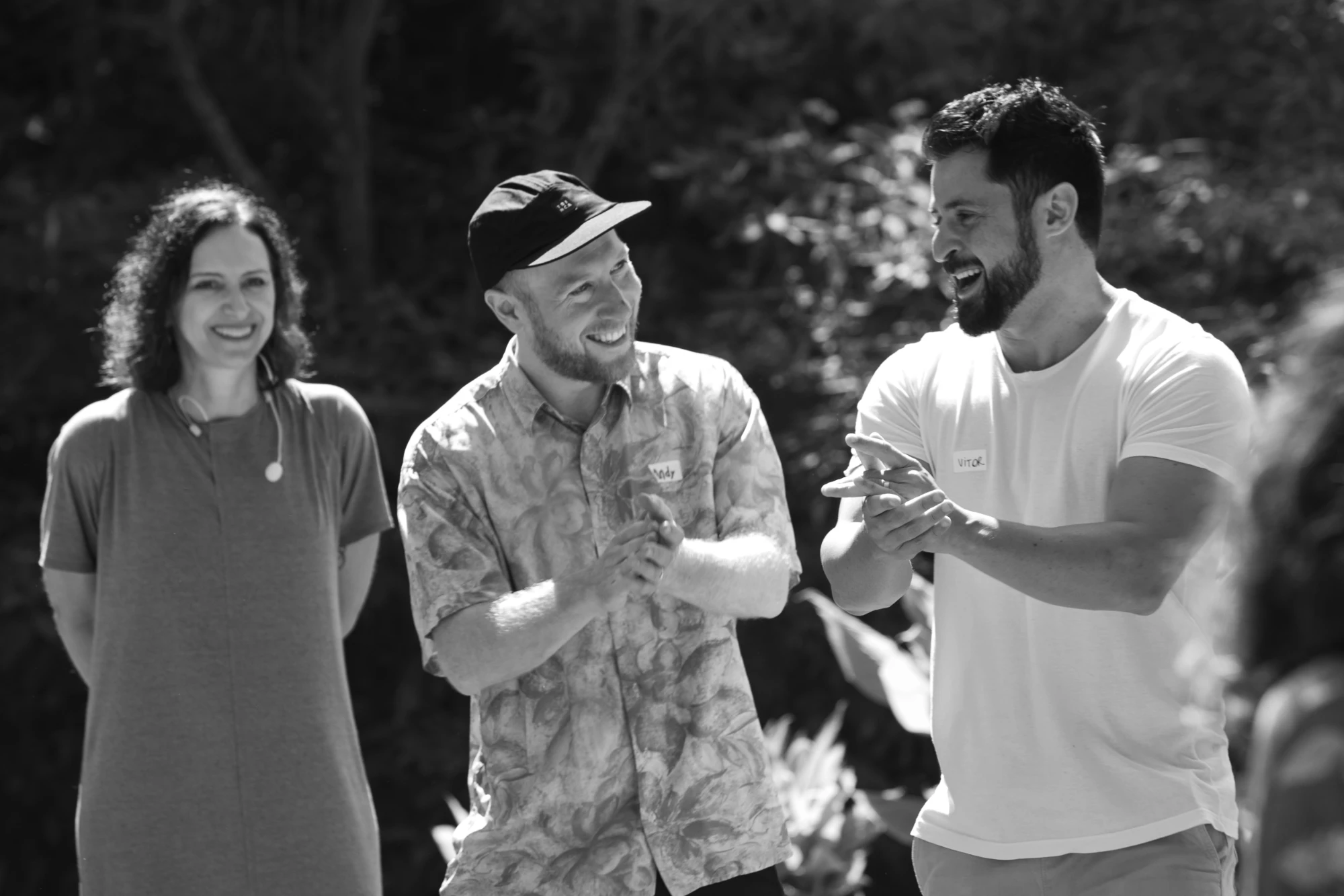 Participants laughing together outdoors